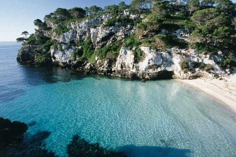 Menorca’s south coast, feet in the water.